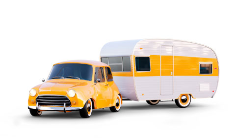 Yellow car with travel trailer attached