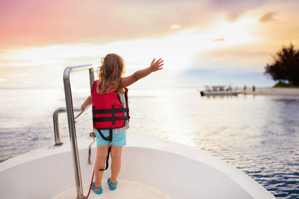 Kids sail on yacht in sea. Child sailing on boat.